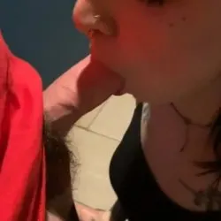 Whore sucking dick at the bar bathroom
